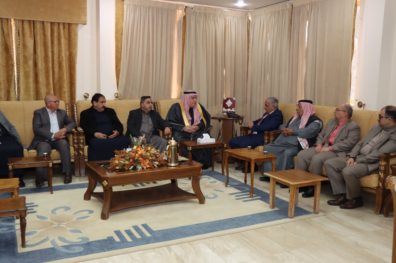 The President of Al-Hussein Bin Talal University meets the President and members of the Ma'an Chamber of Commerce.